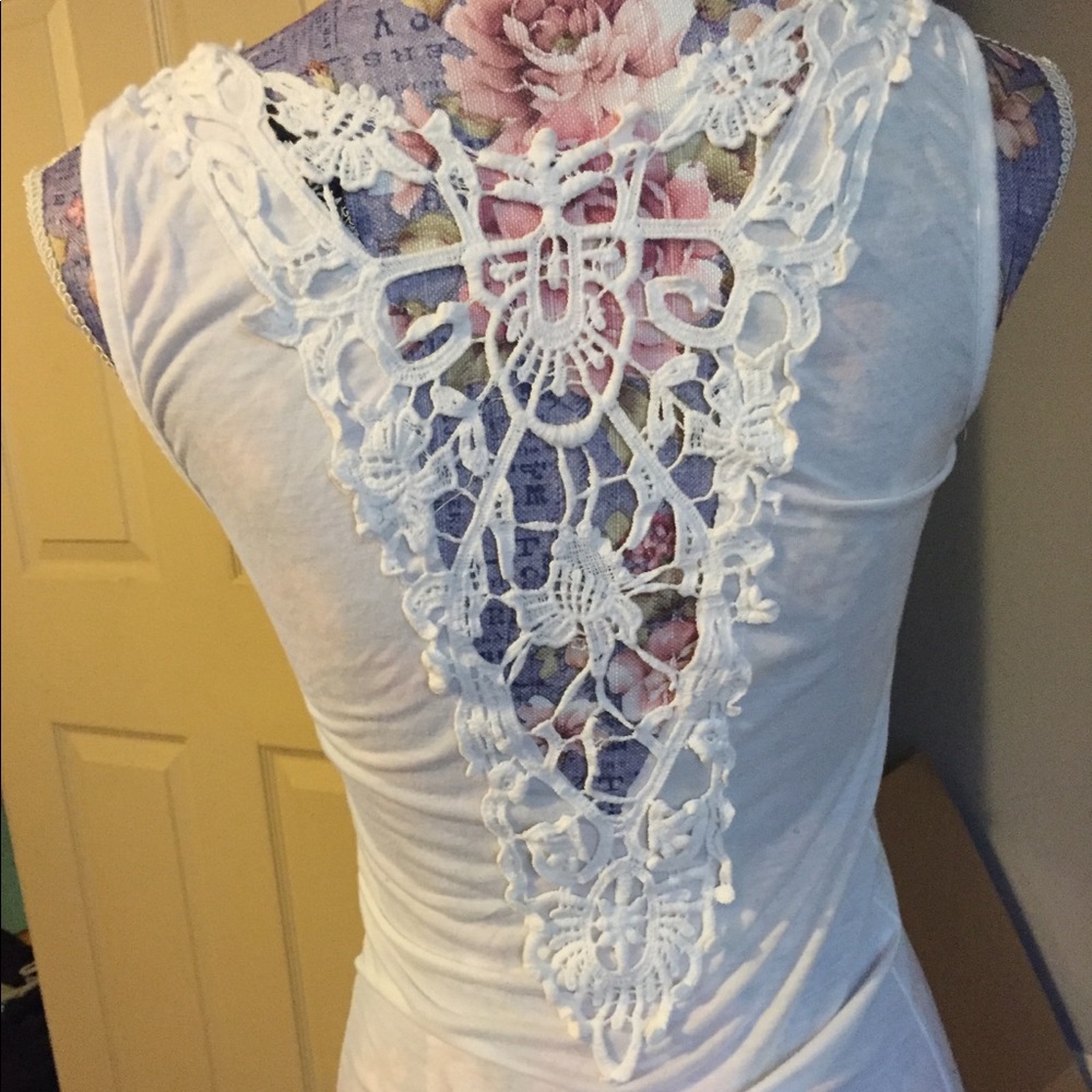 White top with partial crocheted open back